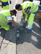 Nid de poule — intervention de réparation par SBTP